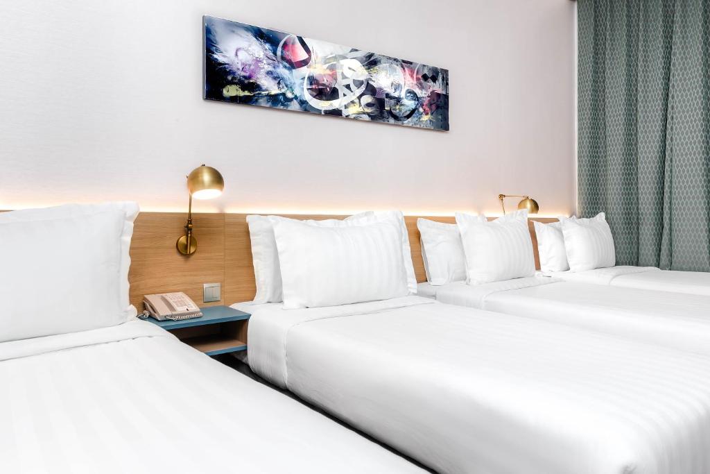 M Hotel Al Dana grup odası