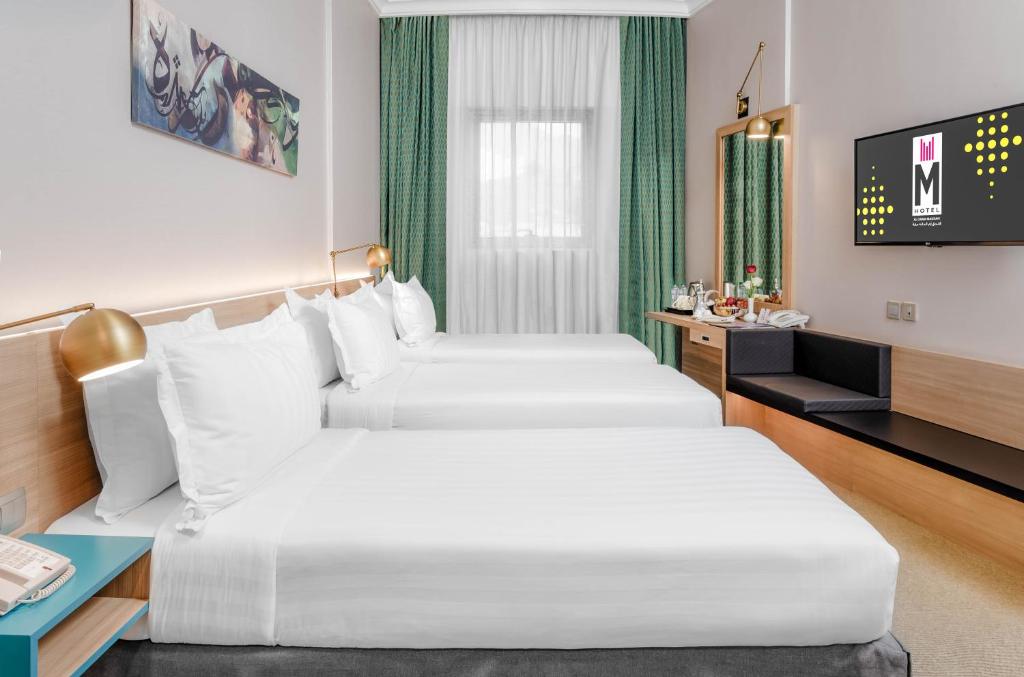 M Hotel Al Dana üç kişilik oda